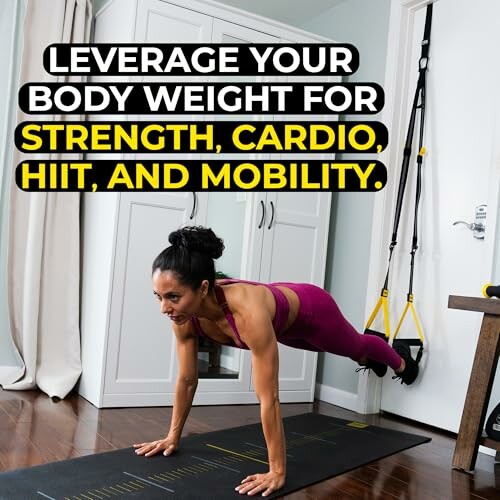 Woman performing bodyweight exercise with suspension trainer at home.