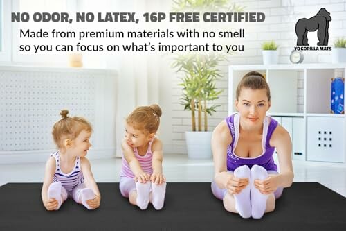 Mother and two daughters on a yoga mat in a bright room.