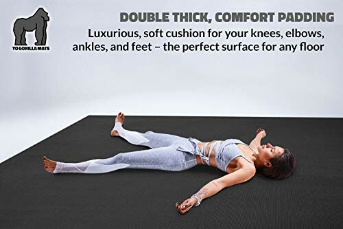 Person lying on a thick yoga mat with comfort padding.